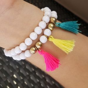 Bracelet with bright tassels